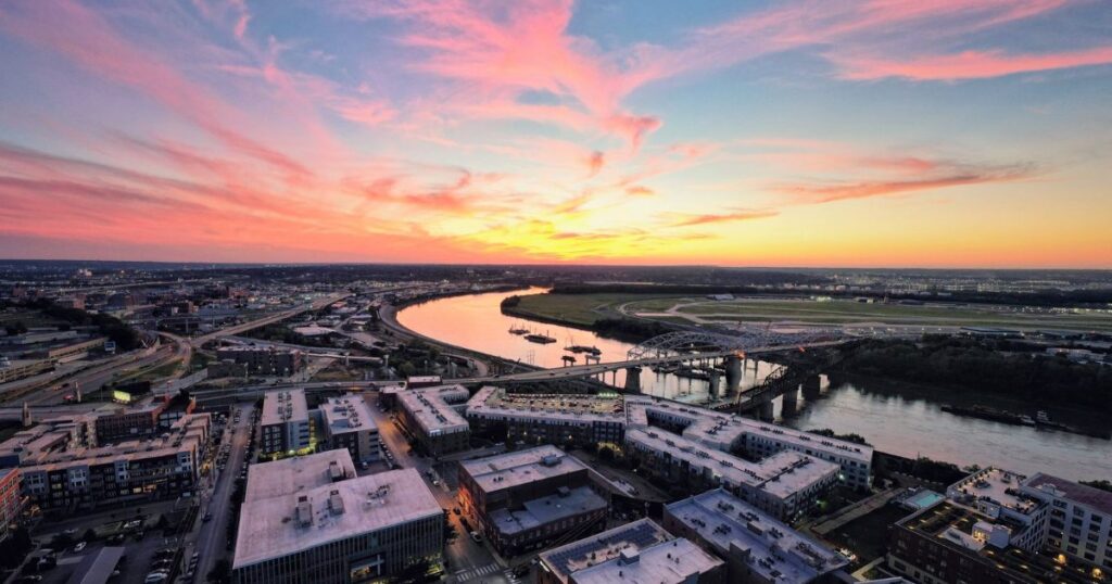 Kansas City skyline and river at sunset, Missouri.