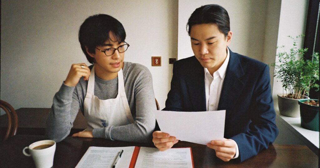 Small business owner reviewing a policy with an insurance agent